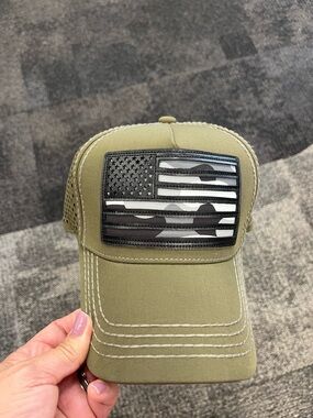 Robin Ruth Olive Green Trucker Hat with Black & Gray Camo Flag Patch